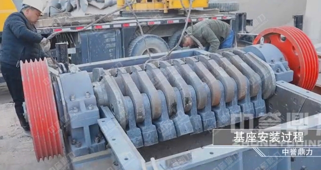 �������b